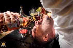 Groom and friends share a whiskey at a bar in La Arbolada Funes, Santa Fe